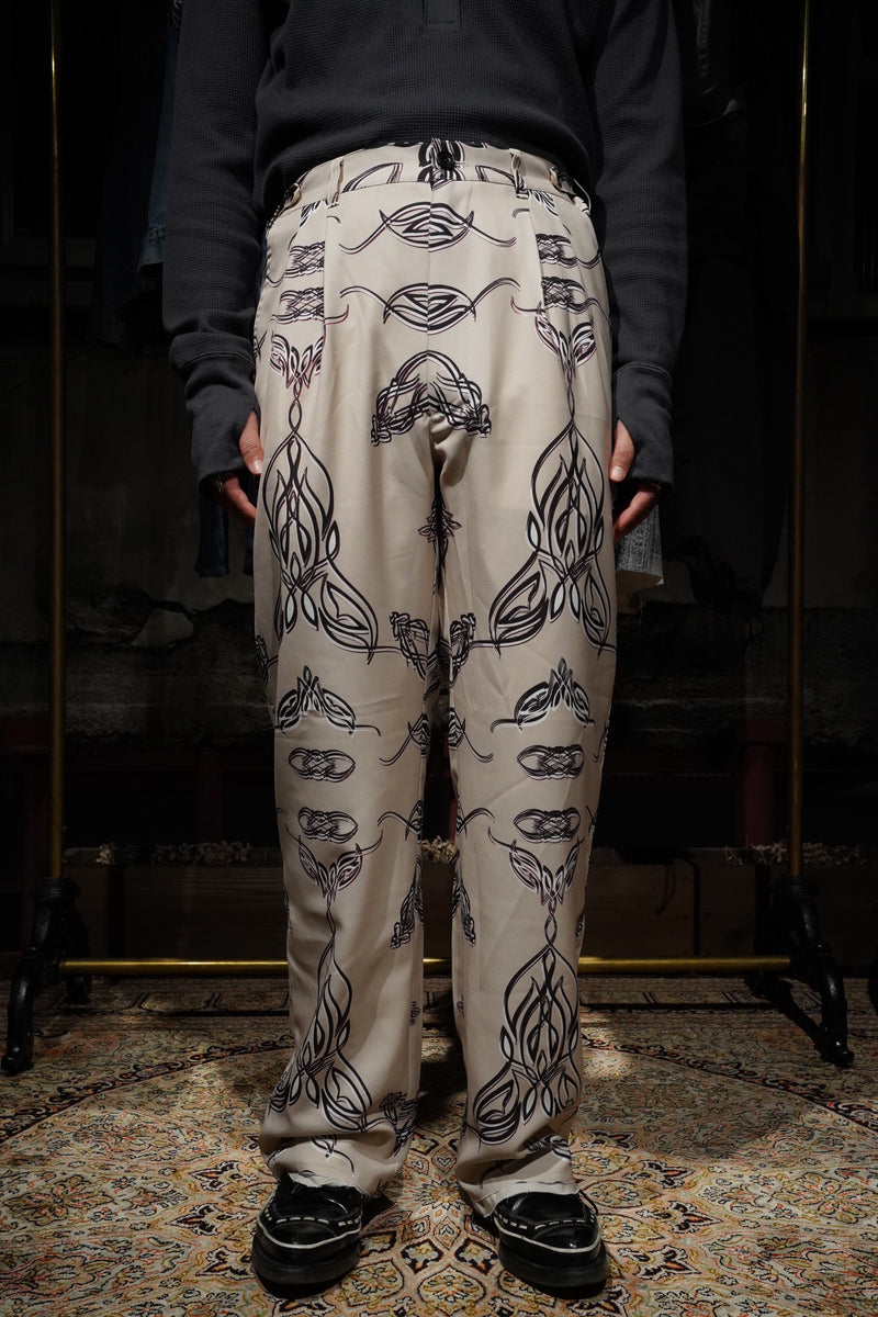 Children of the discordanceのPERSONAL DATA PRINT TROUSERS (BEIGE