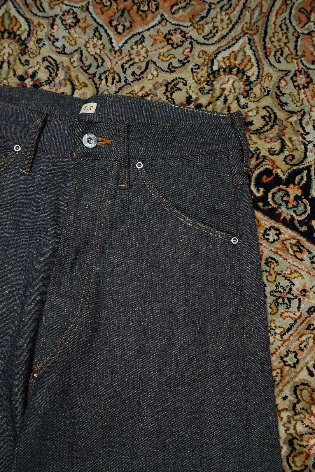 Taiga Takahashi(タイガタカハシ)のDENIM TROUSERS W(RAW INDIGO