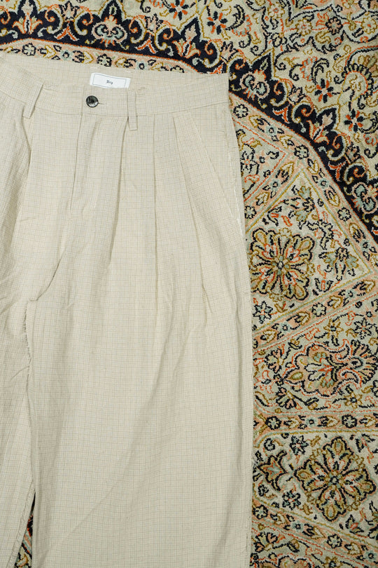 Urig(ウーリッヒ)2026SSのPIN CHECK SCHADEN 3TUCK PANTS NL (ECRU