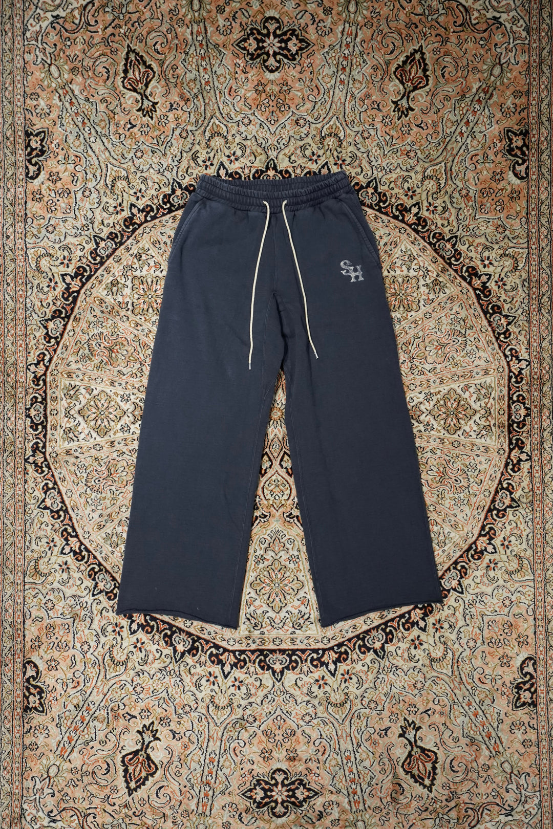 SUGARHILL(シュガーヒル)のLOGO PRINTED SWEAT TROUSERS(OLD NAVY