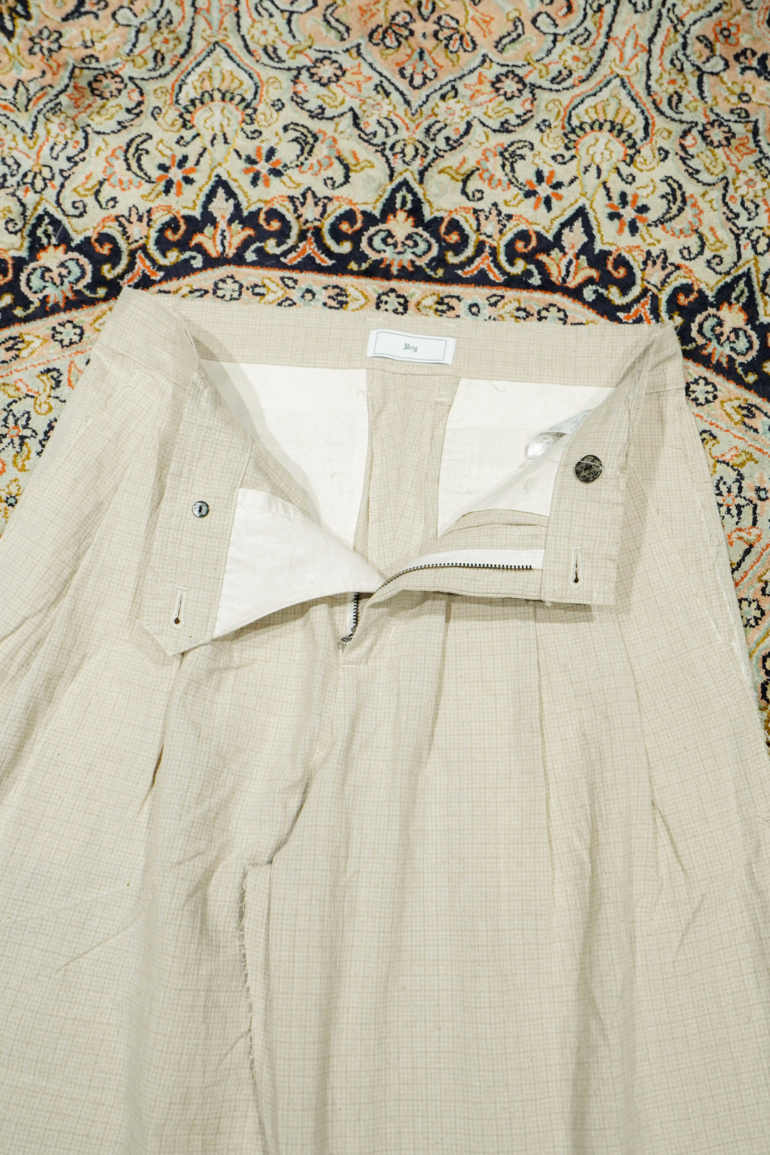 Urig(ウーリッヒ)2026SSのPIN CHECK SCHADEN 3TUCK PANTS NL (ECRU
