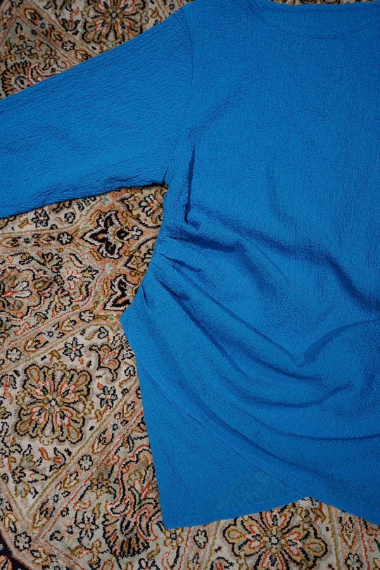 Omar Afridi(オマールアフリディ)25SSのAfridi DRAPED L/S TOP(BLUE