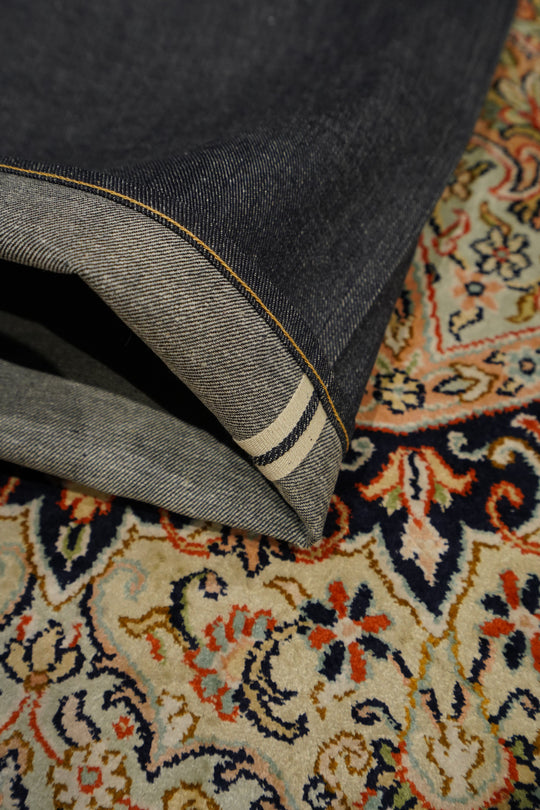 Taiga Takahashi(タイガタカハシ)のBUCKLE-BACKED DENIM TROUSERS(RAW