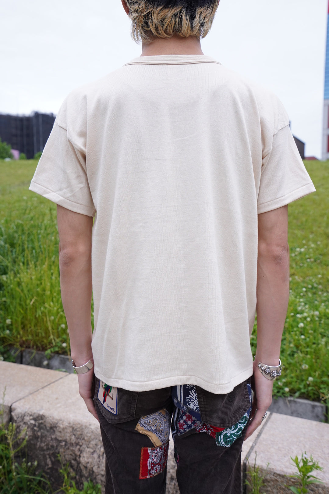 Taiga Takahashi(タイガタカハシ)のTEE SHIRT(IVORY)(Tシャツ)の通販